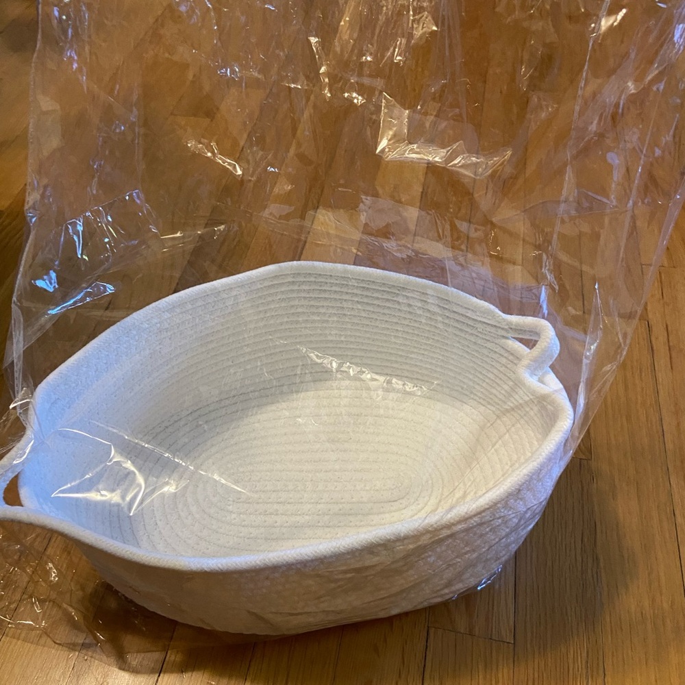 Gifting basket with plastic wrap.